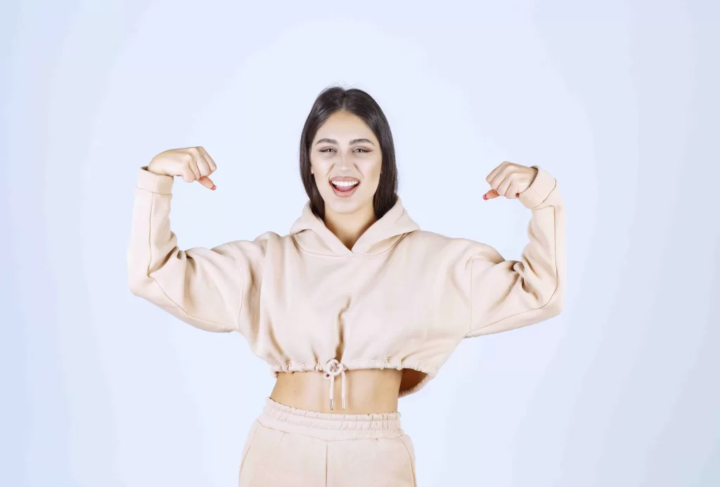 Girl Raising Her Fists And Feeling Powerful